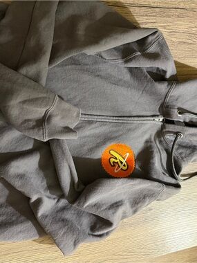 Gray Zip-Up Hoodie with Orange Patch